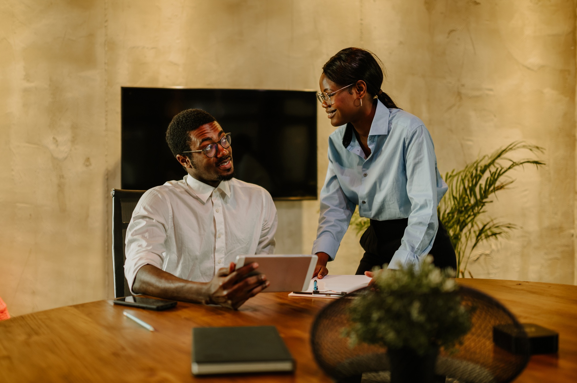 Couple of an african american business people having a meeting at the office